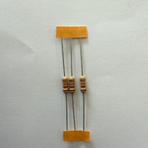 Electronic component: 0.50 watt, 11 kohm resistor.