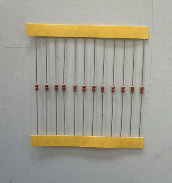 Electronic component: 0.125 watt, 3.3 kohm resistor.