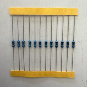 Electronic component: 0.25 watt, 1%, 1 mohm resistor.