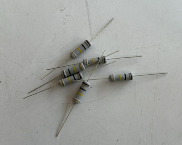 Electronic component: 2 watt, 5%, 100 kohm resistor.